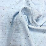 Mousseline Azul Bebê com pintas douradas